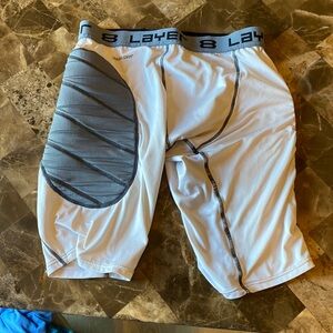 Compressions shorts with padding on sides. Size Medium.